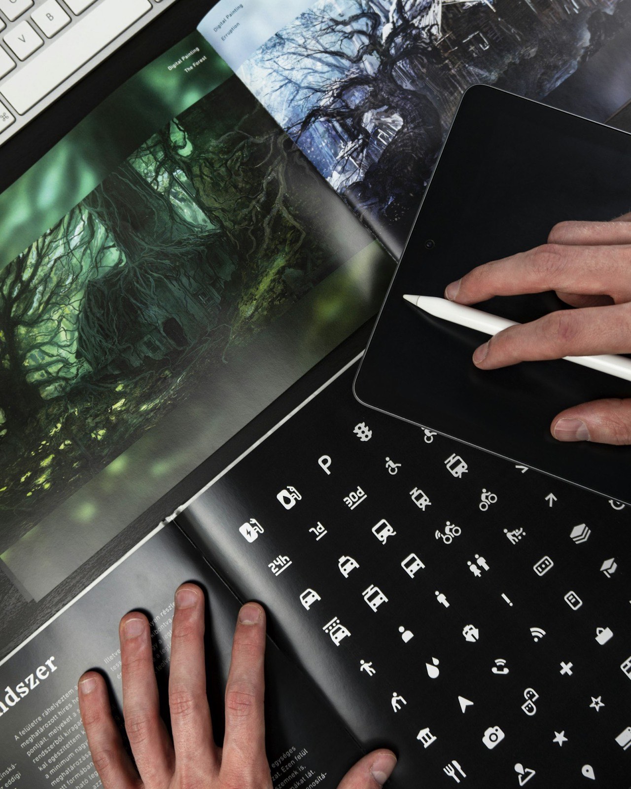หน้างานออกแบบที่มี layout, ภาพประกอบ และแผ่นไอคอนระบบ รวมถึงสัญลักษณ์ accessibility